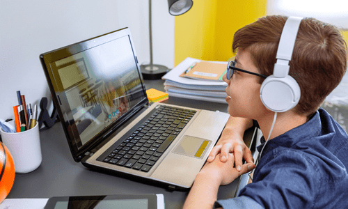 young kid doing an online class